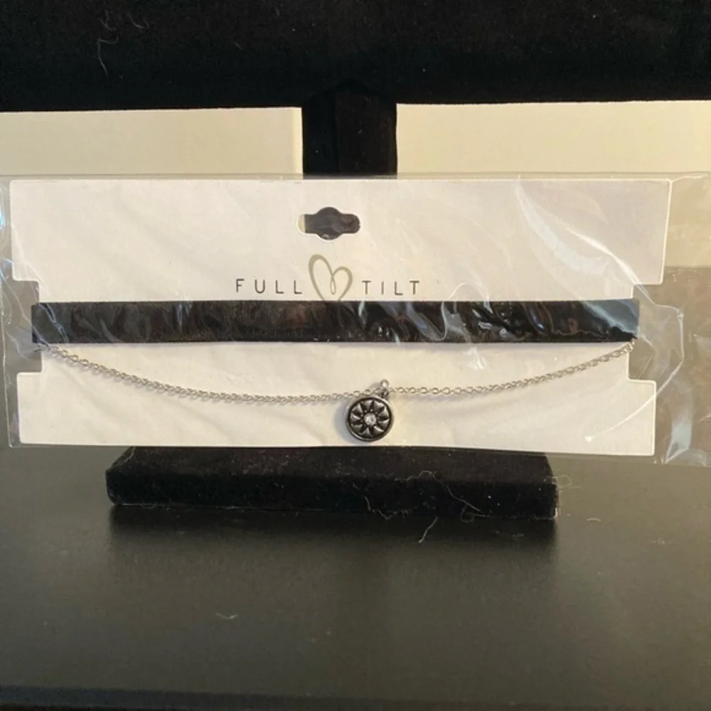 Full Tilt choker. Black velvet and silver tone with charm.